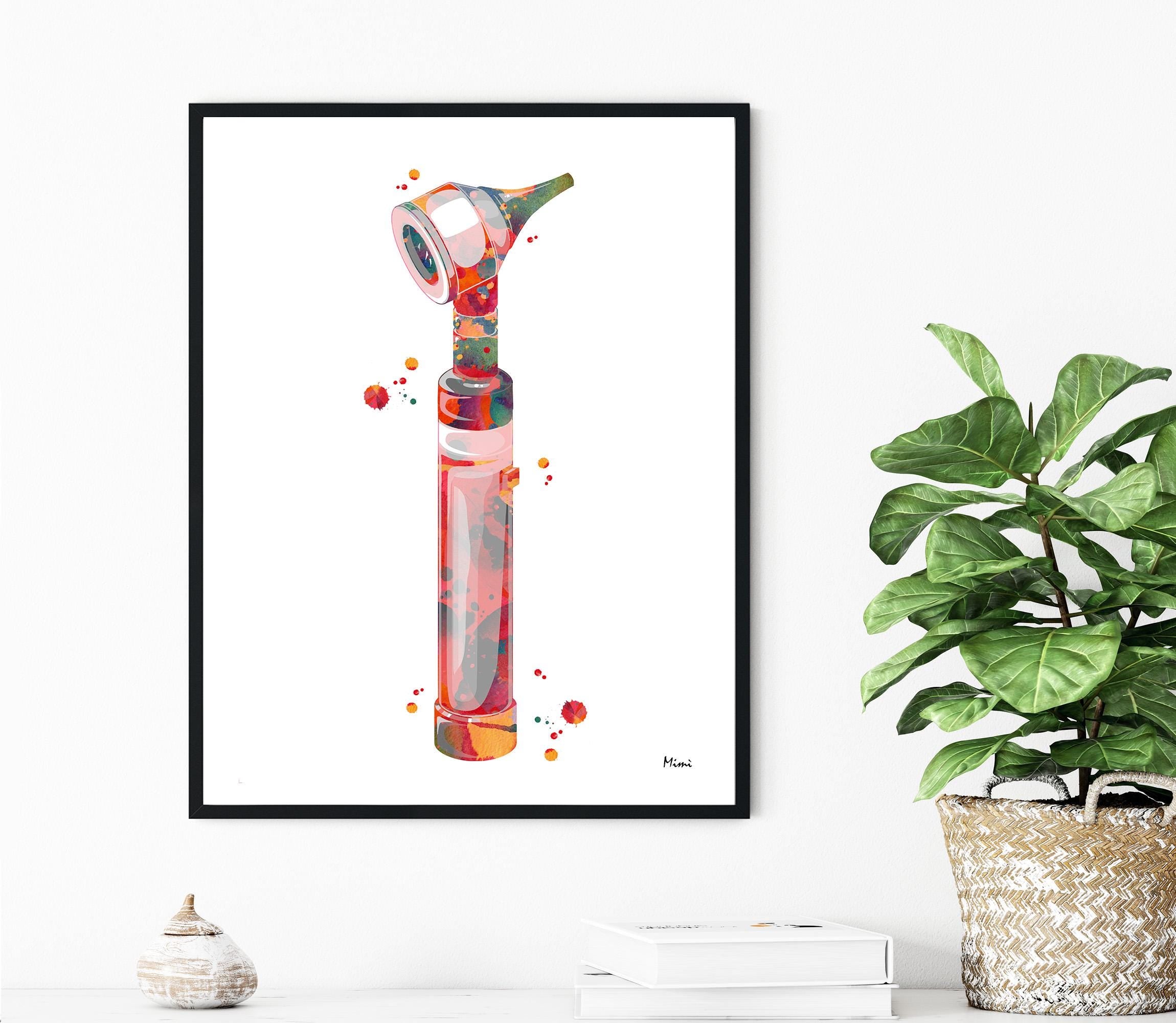 Framed artwork of a colorful Otoscope on a white wall with a plant to the right.