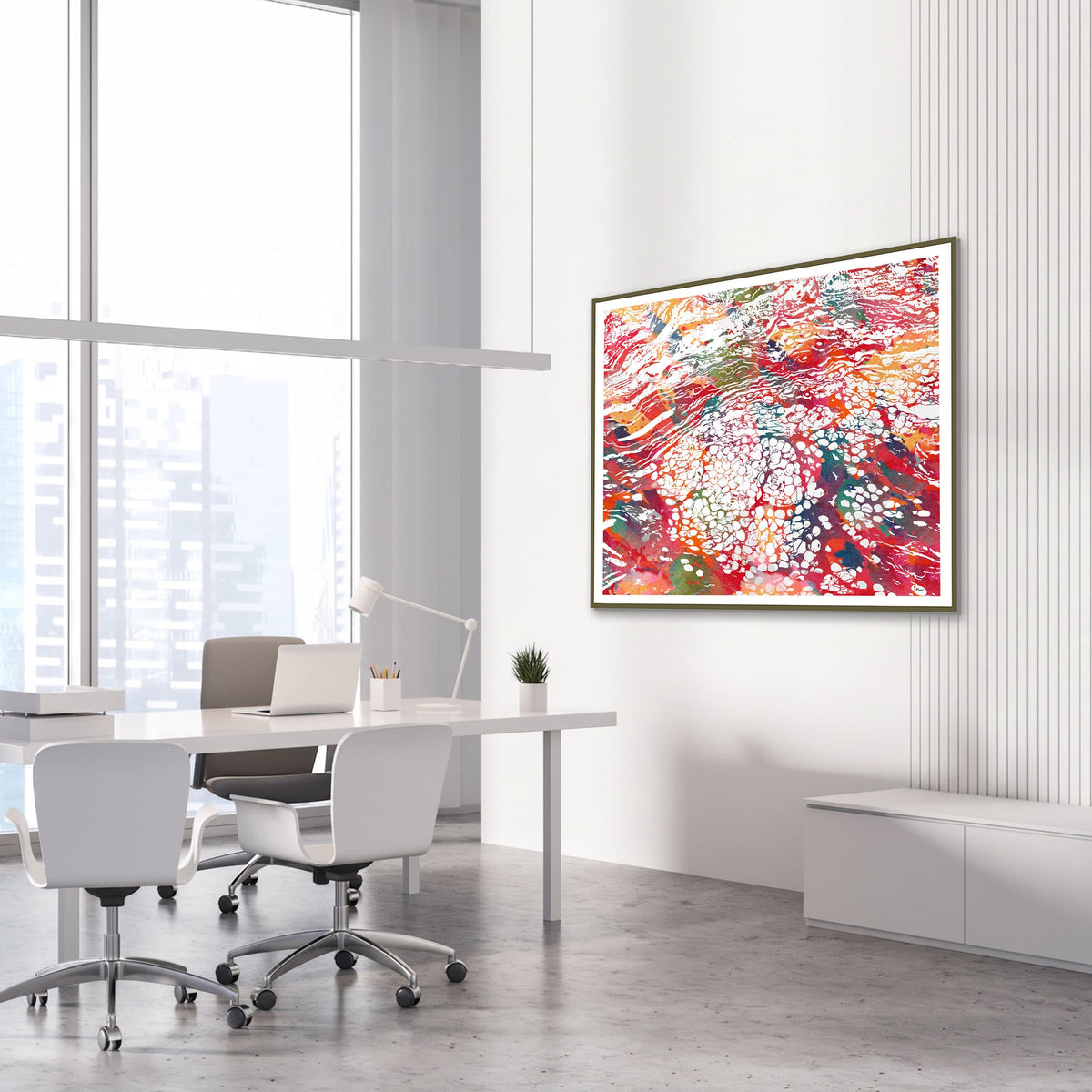 Framed breast tissue histology watercolor print in an OB-GYN clinic