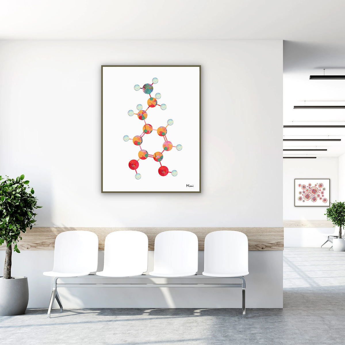 Framed dopamine molecular structure watercolor print in a clinic waiting room