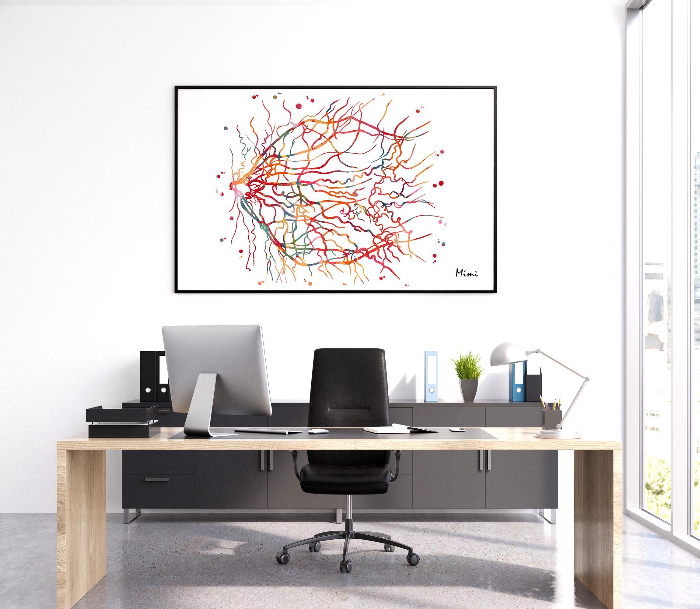 Modern doctor office desk with computer setup and colorful eye anatomy art on the wall.