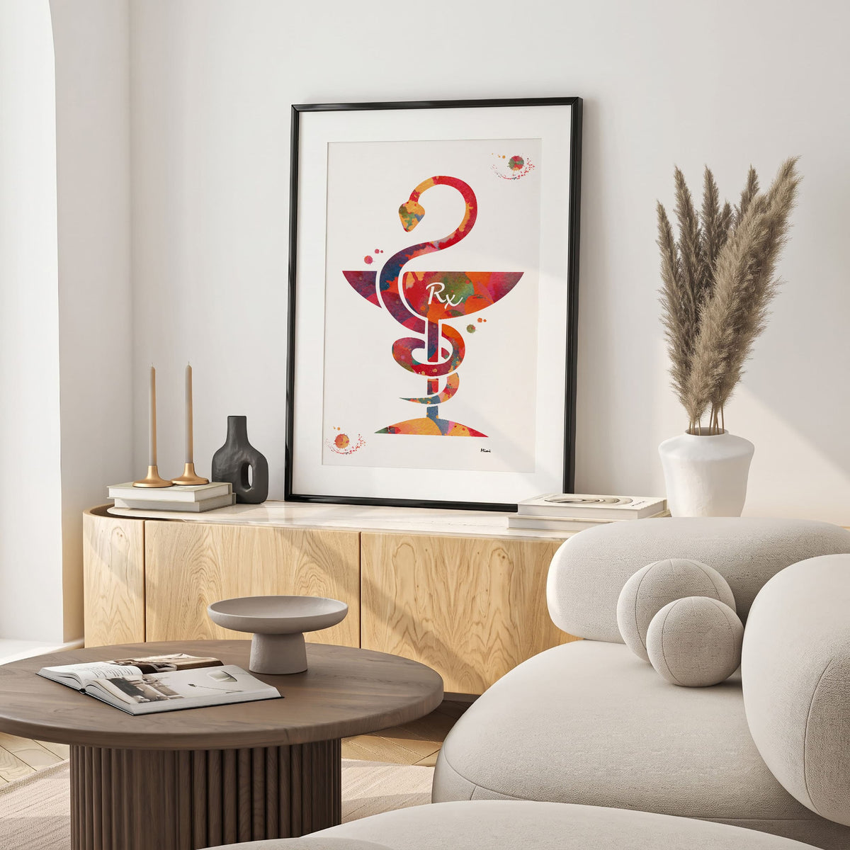 rx caduceus watercolor print hanging in a warm living room
