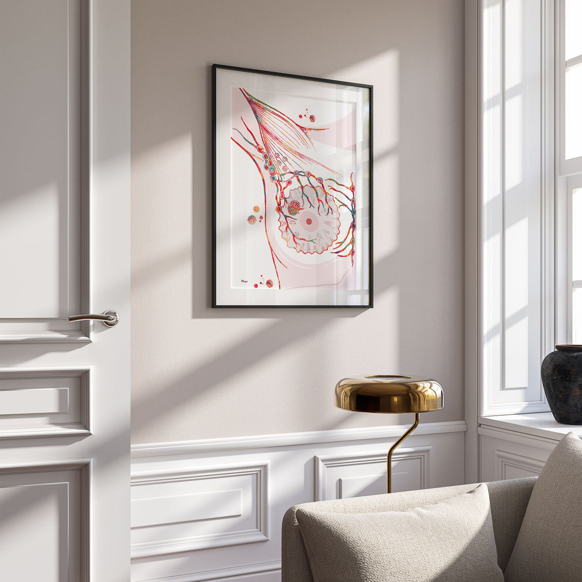 Framed sentinel lymph node watercolor print in a living room