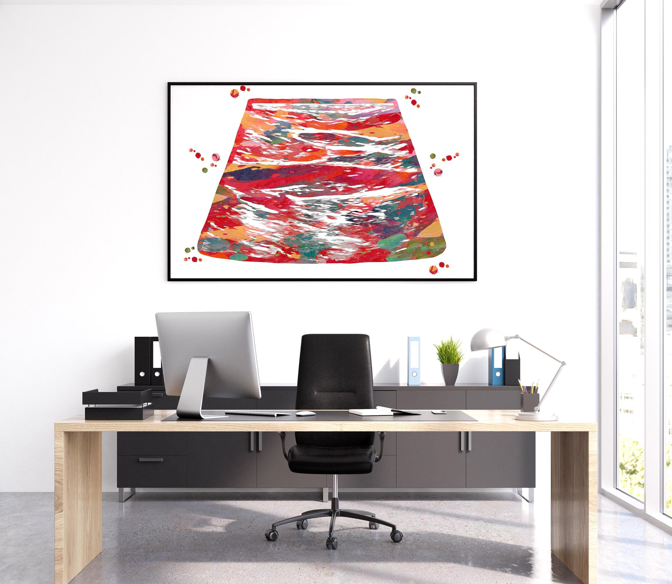 Modern office setup with a doctor's desk, chair, and a colorful abstract anatomy art of a venous ultrasound hanging on a wall