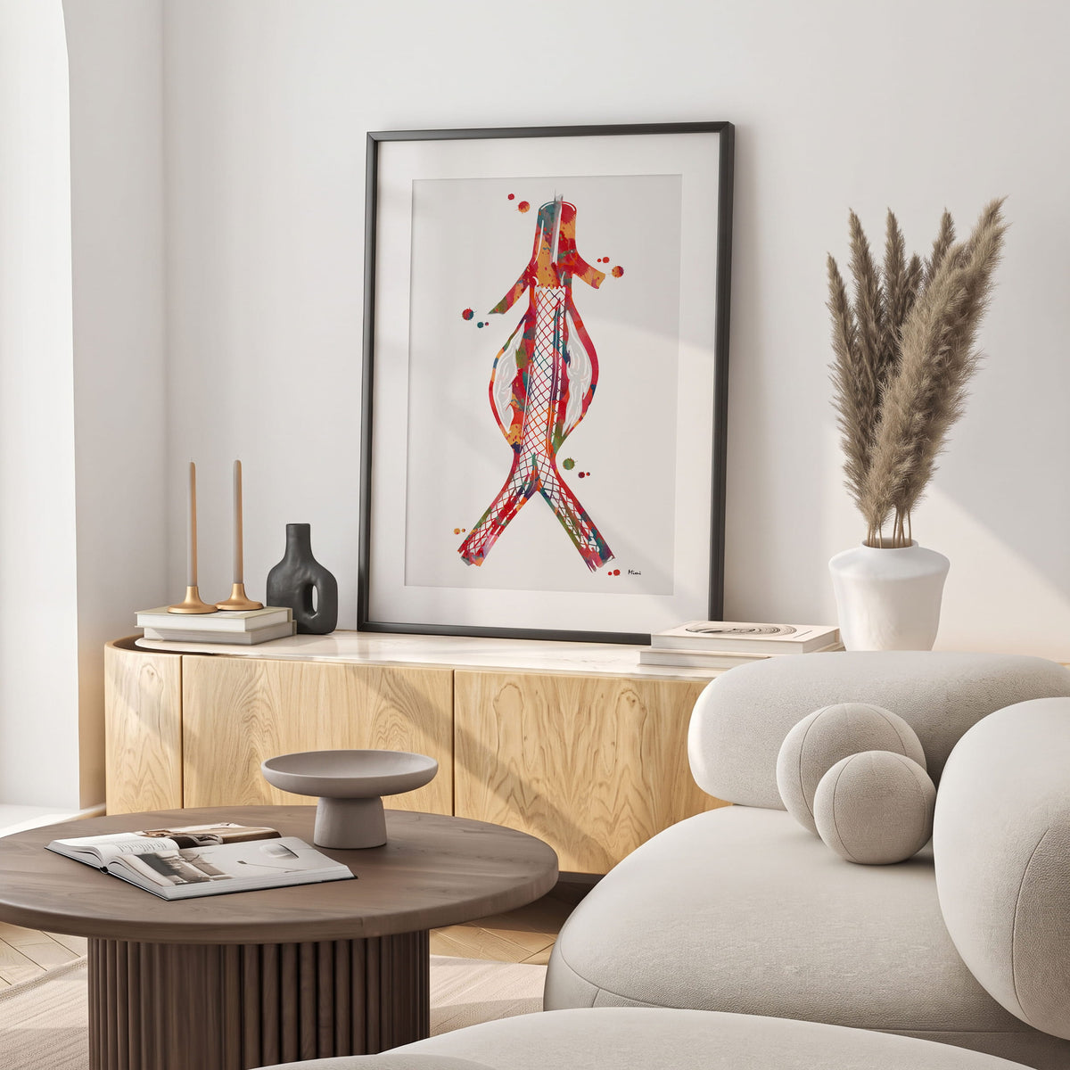 Framed abdominal aortic stent watercolor print in a warm living room