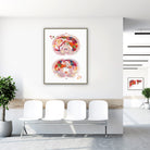 Framed abdomen cross-section watercolor print in a clinic waiting room