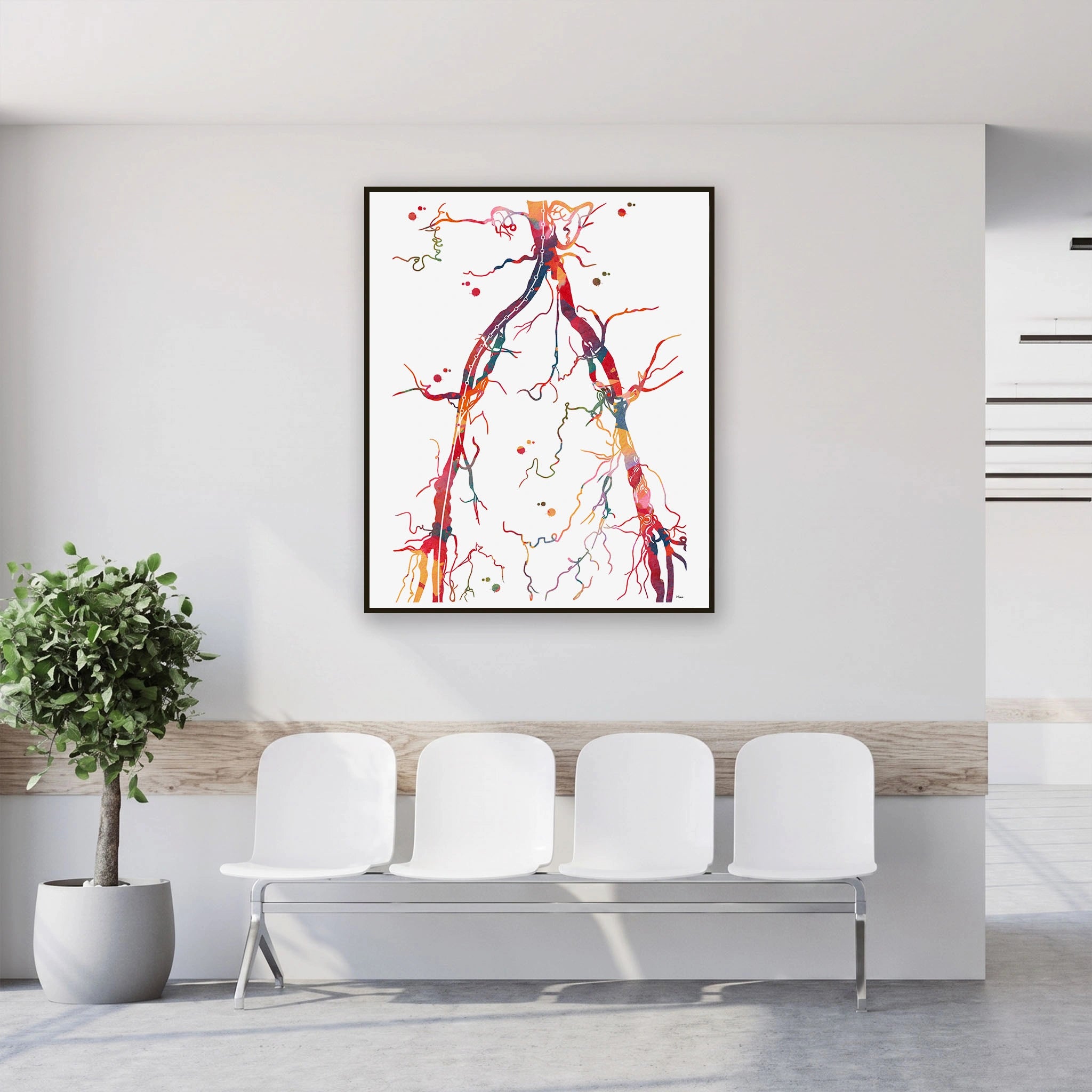 Framed abdominal aorta and pelvic arteries angiogram watercolor print in a clinic waiting room