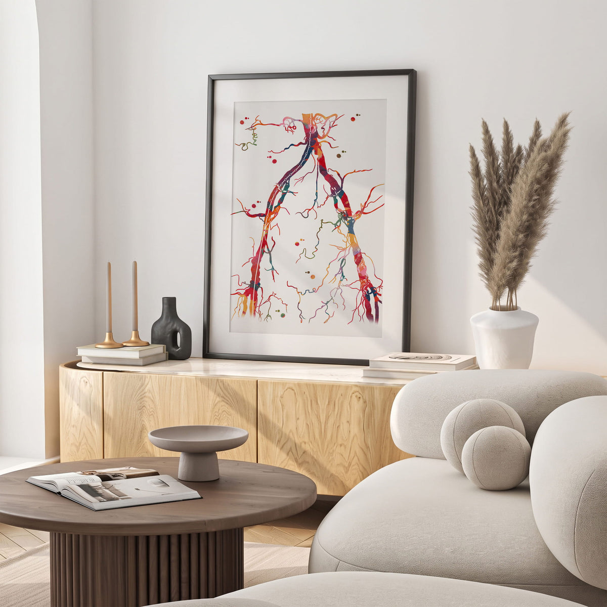Framed abdominal aorta and pelvic arteries angiogram watercolor print in a warm living room