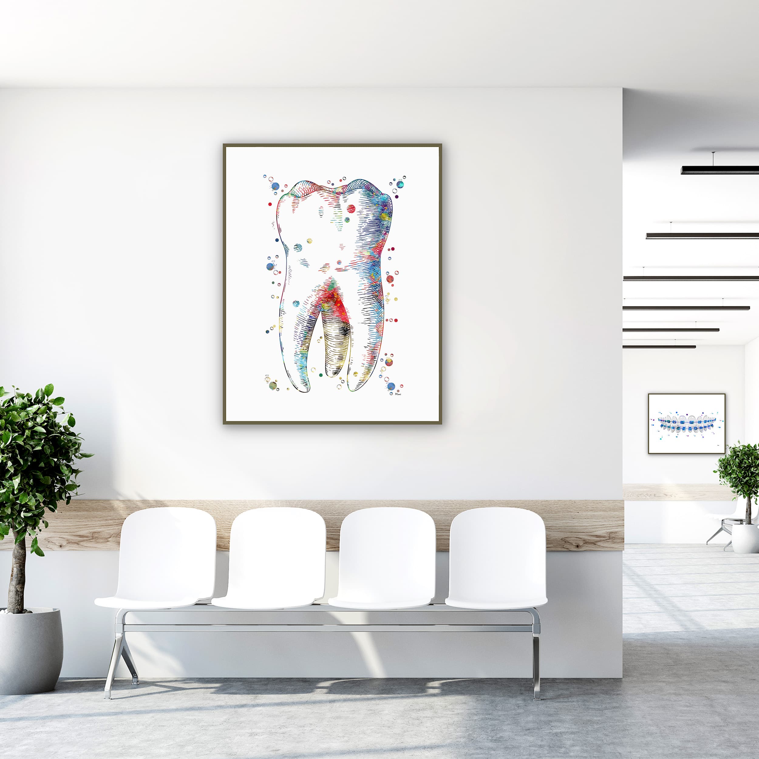 Framed abstract molar anatomy watercolor print in a clinic waiting room