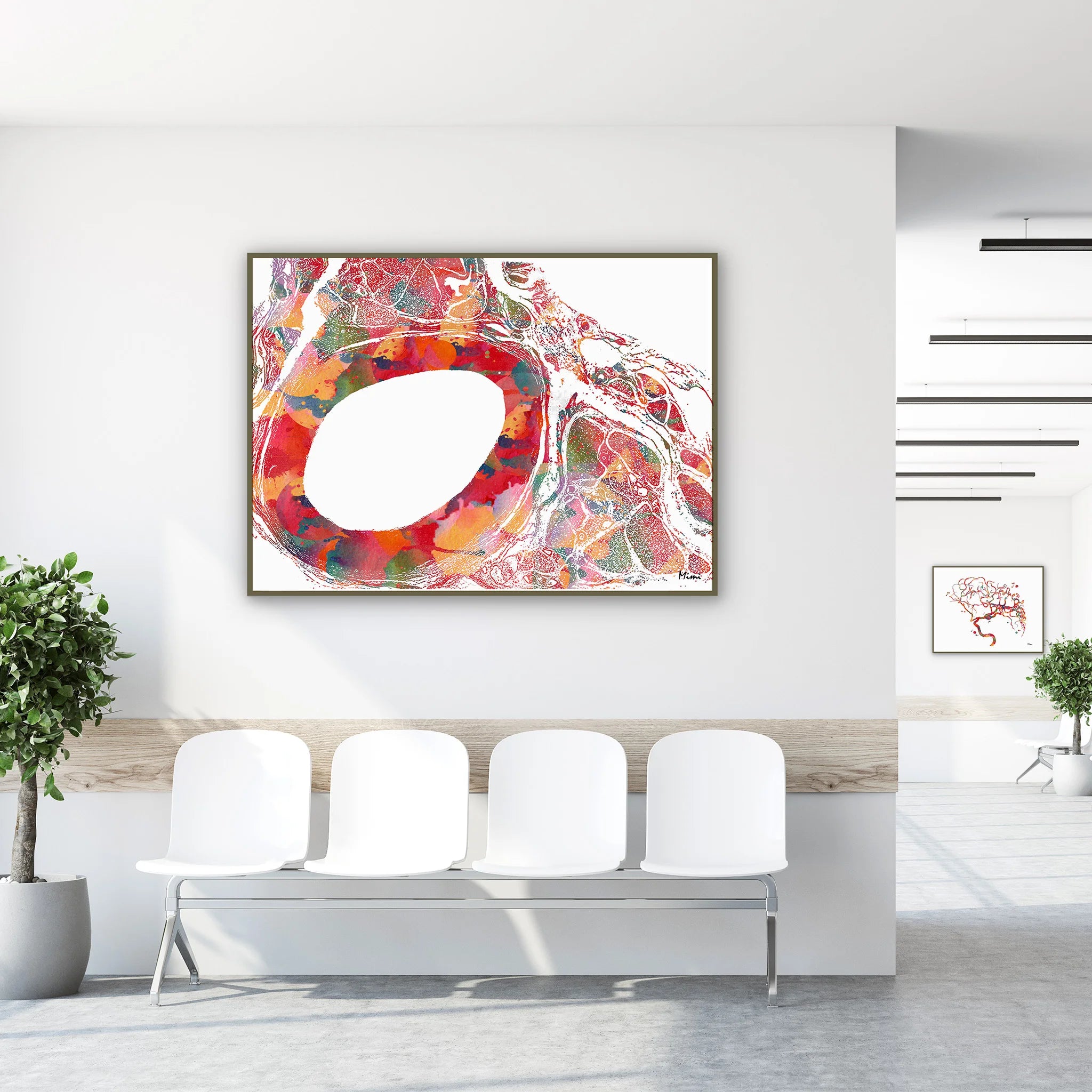 Framed aorta cross-section histology watercolor print in a clinic waiting room