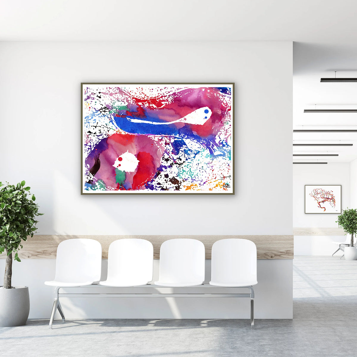 Framed artery and vein cross-section watercolor print in a clinic waiting room