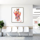 Framed back muscles anatomy watercolor print in a clinic waiting room