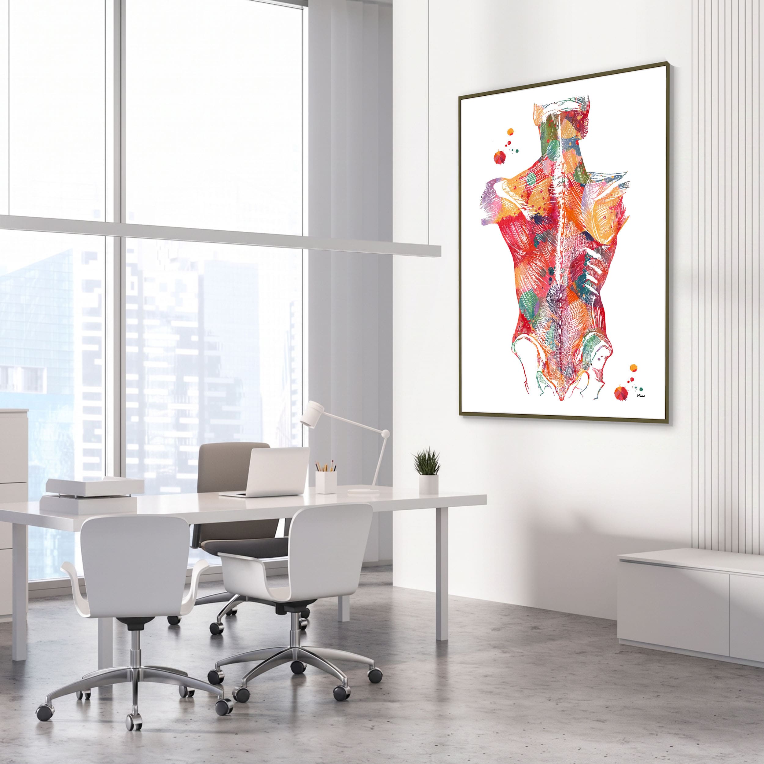 Framed back muscles anatomy watercolor print in an orthopedic clinic