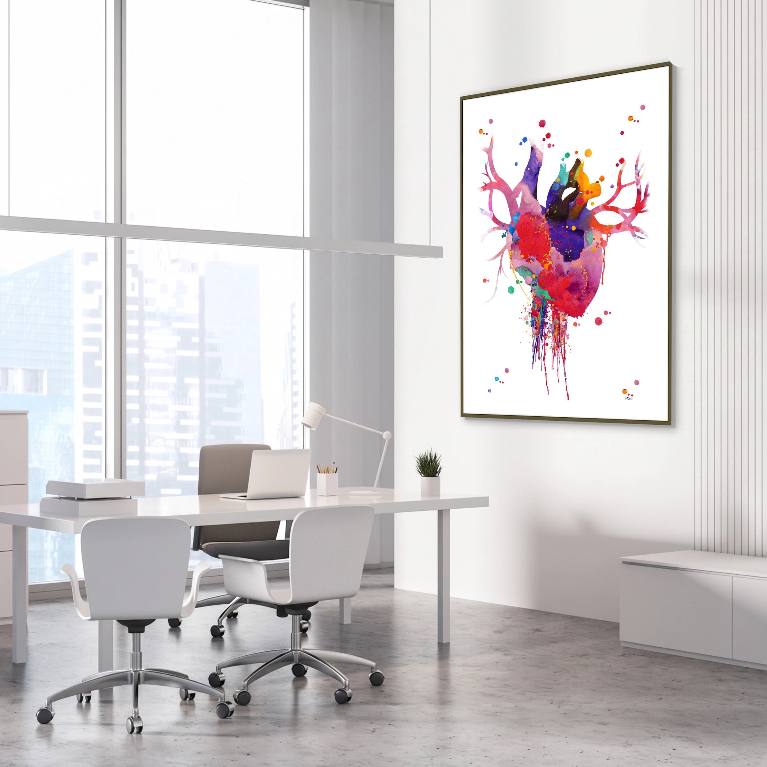 Framed bold modern anatomical heart watercolor print in a cardiology clinic