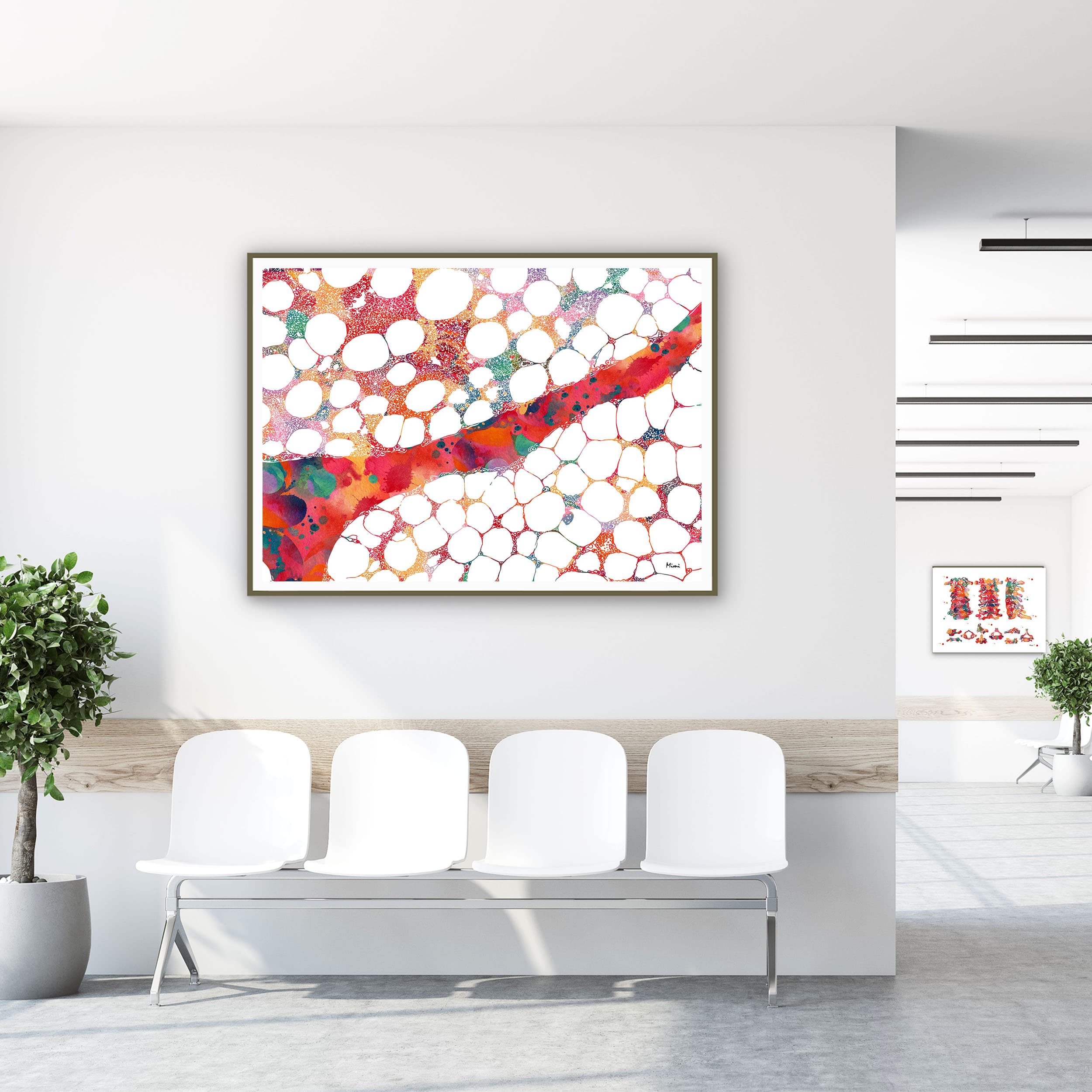 Framed bone marrow histology watercolor print in a clinic waiting room