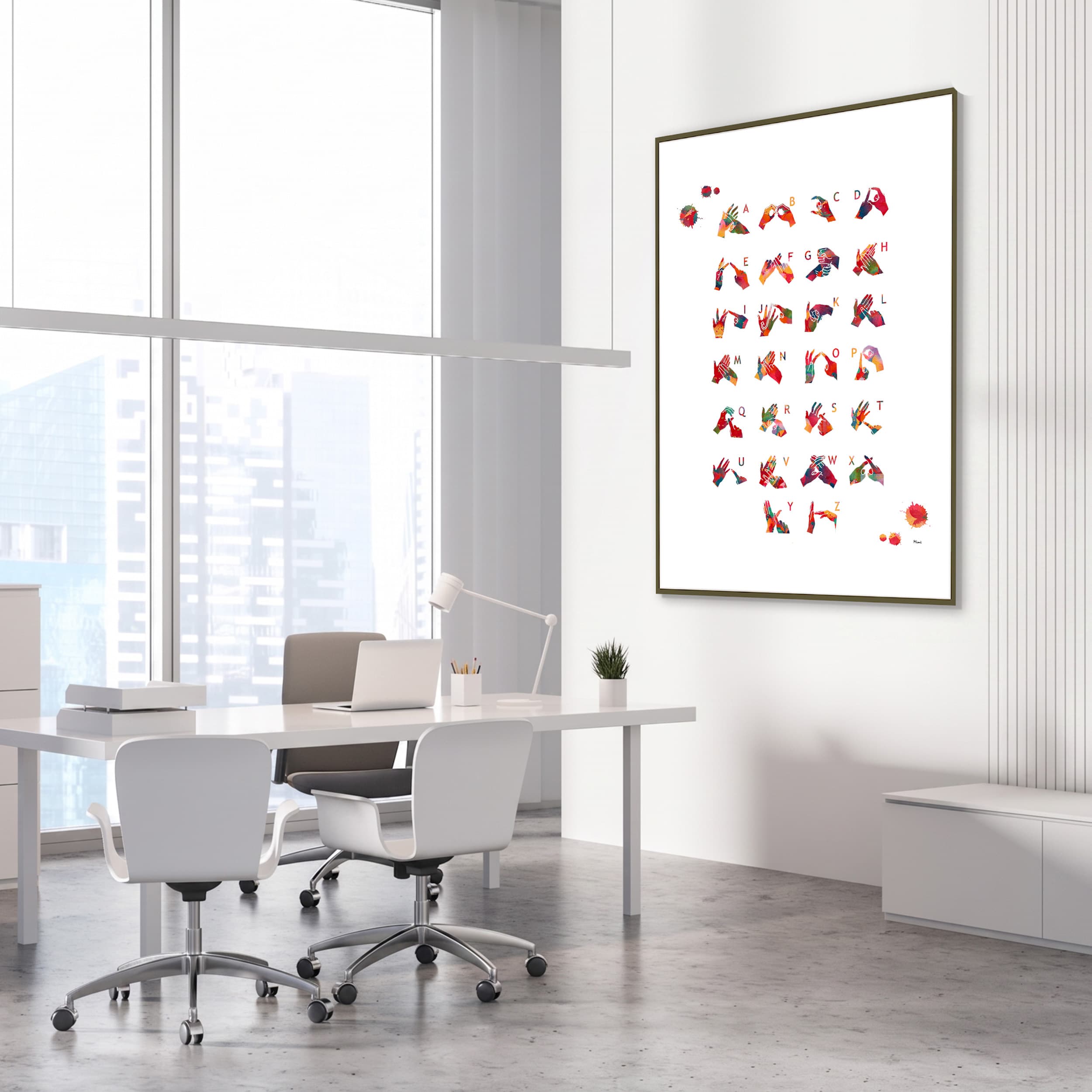 Framed bsl alphabet watercolor print in an ENT clinic