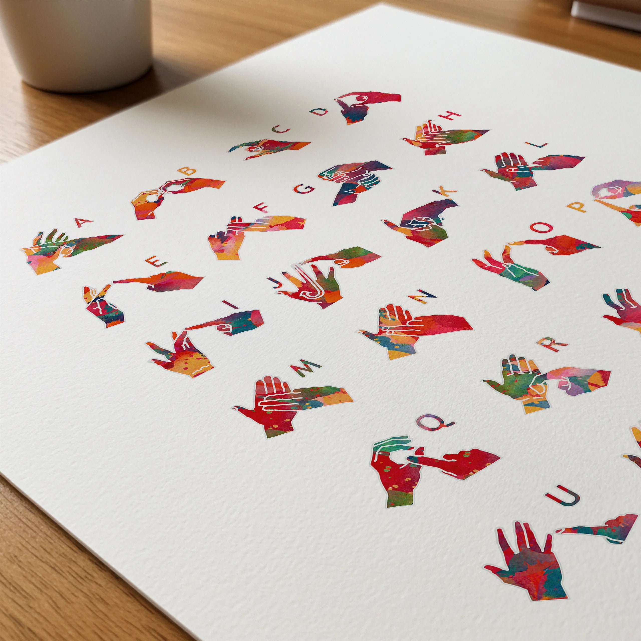 Close-up of bsl alphabet watercolor print showing paper texture and grain