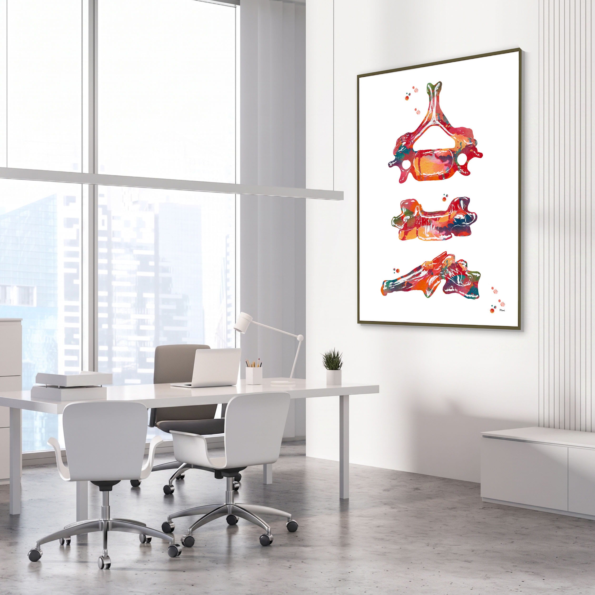 Framed c6 vertebra multi-view watercolor print in an orthopedic clinic