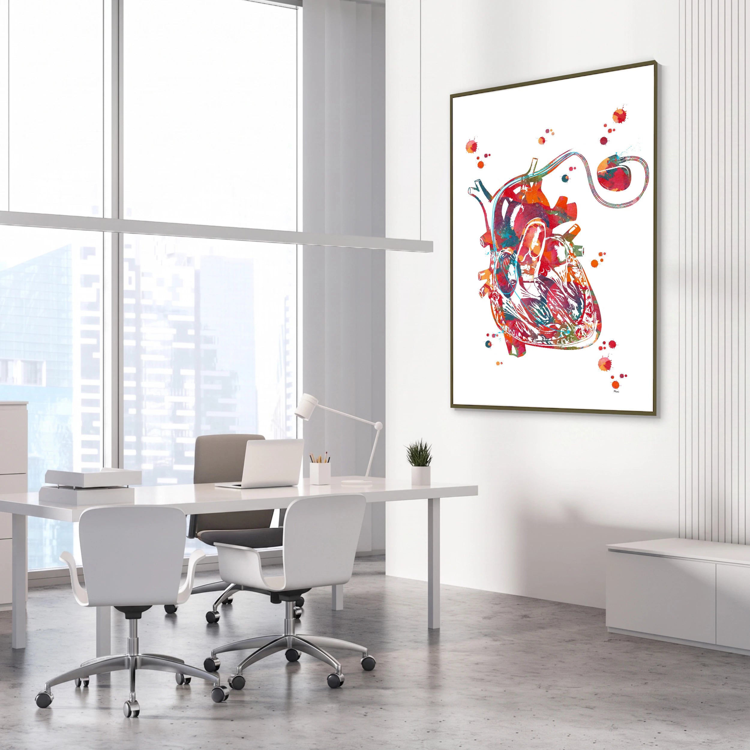 Framed cardiac pacemaker watercolor print in a cardiology clinic