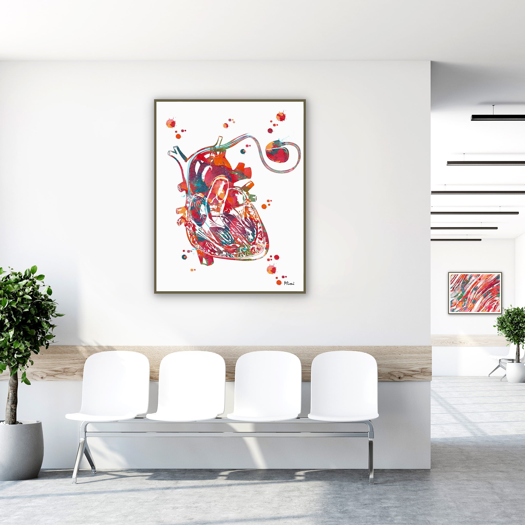 Framed cardiac pacemaker watercolor print in a clinic waiting room