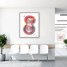 Framed cell division watercolor print in a clinic waiting room