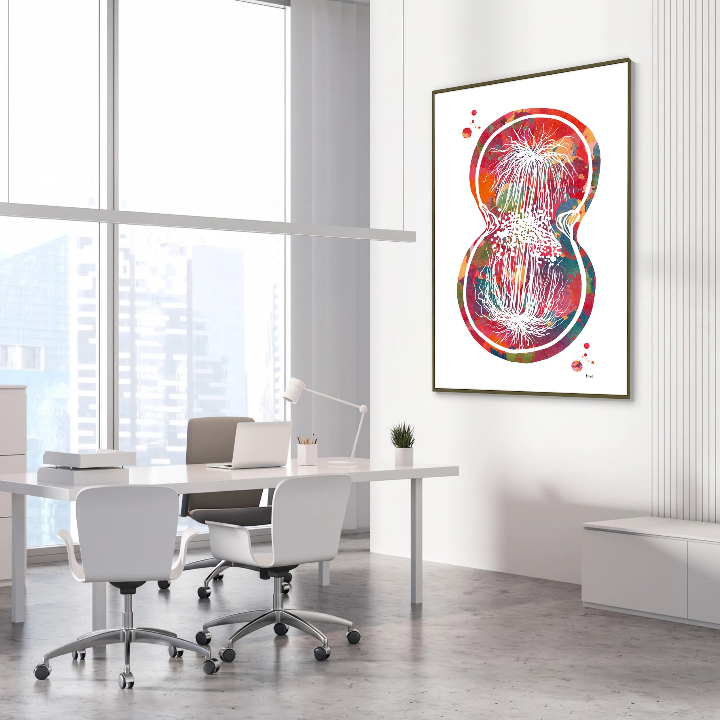 Framed cell division watercolor print in a science laboratory office