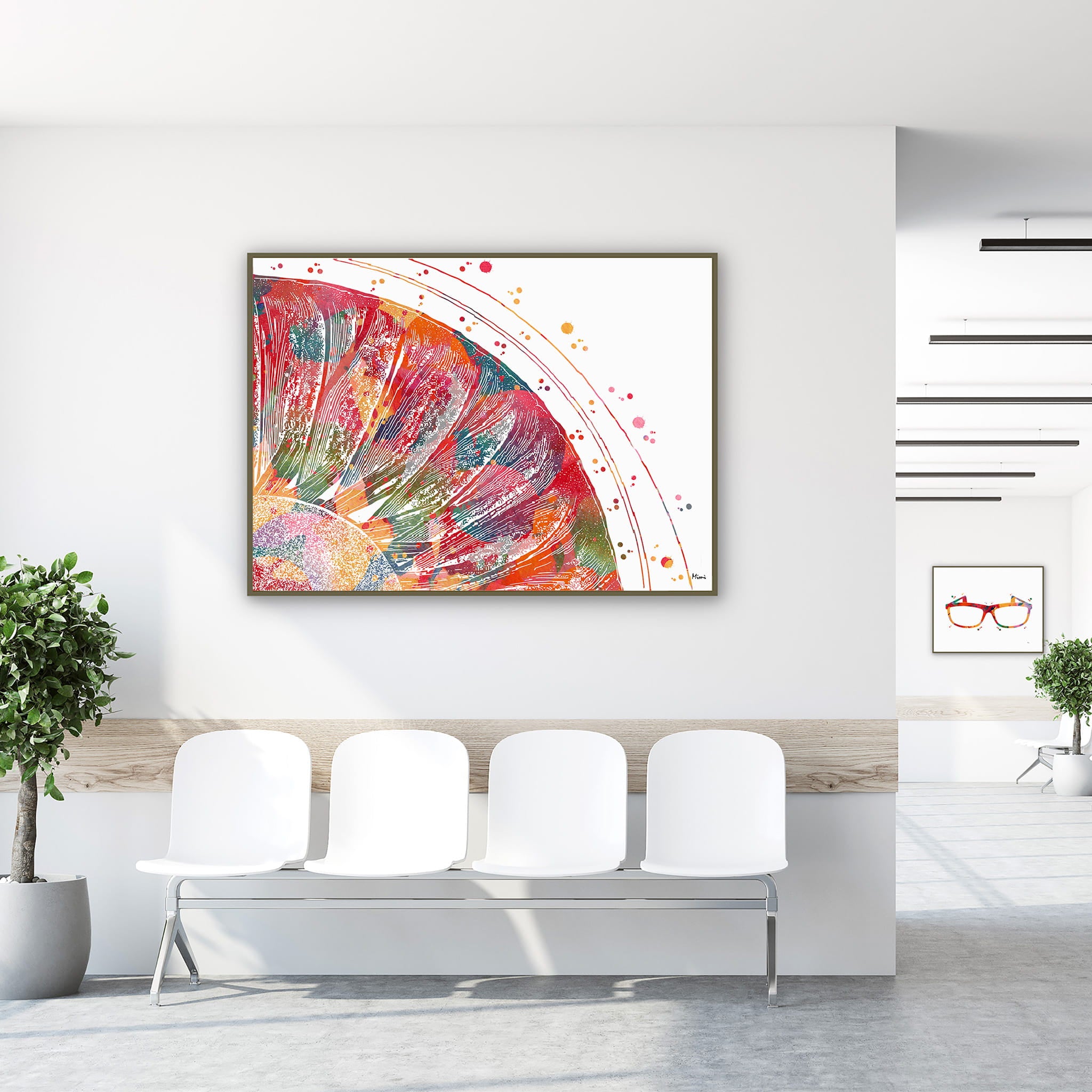 Framed ciliary body & lens watercolor print in a clinic waiting room