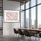 Framed circuit board watercolor print in a meeting room