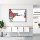 Framed cochlea histology watercolor print in a clinic waiting room