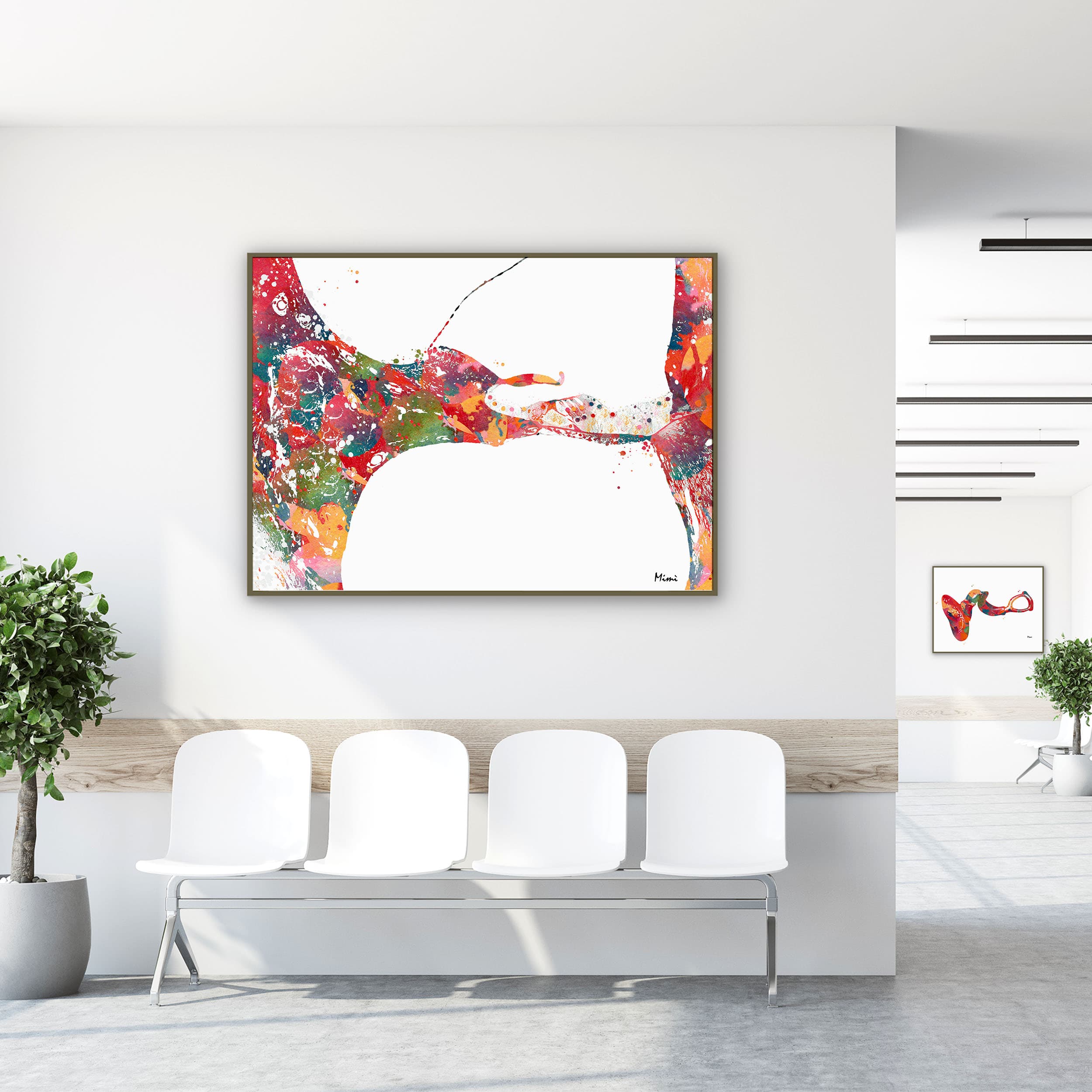 Framed cochlea histology watercolor print in a clinic waiting room