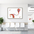 Framed cochlear implant watercolor print in a clinic waiting room