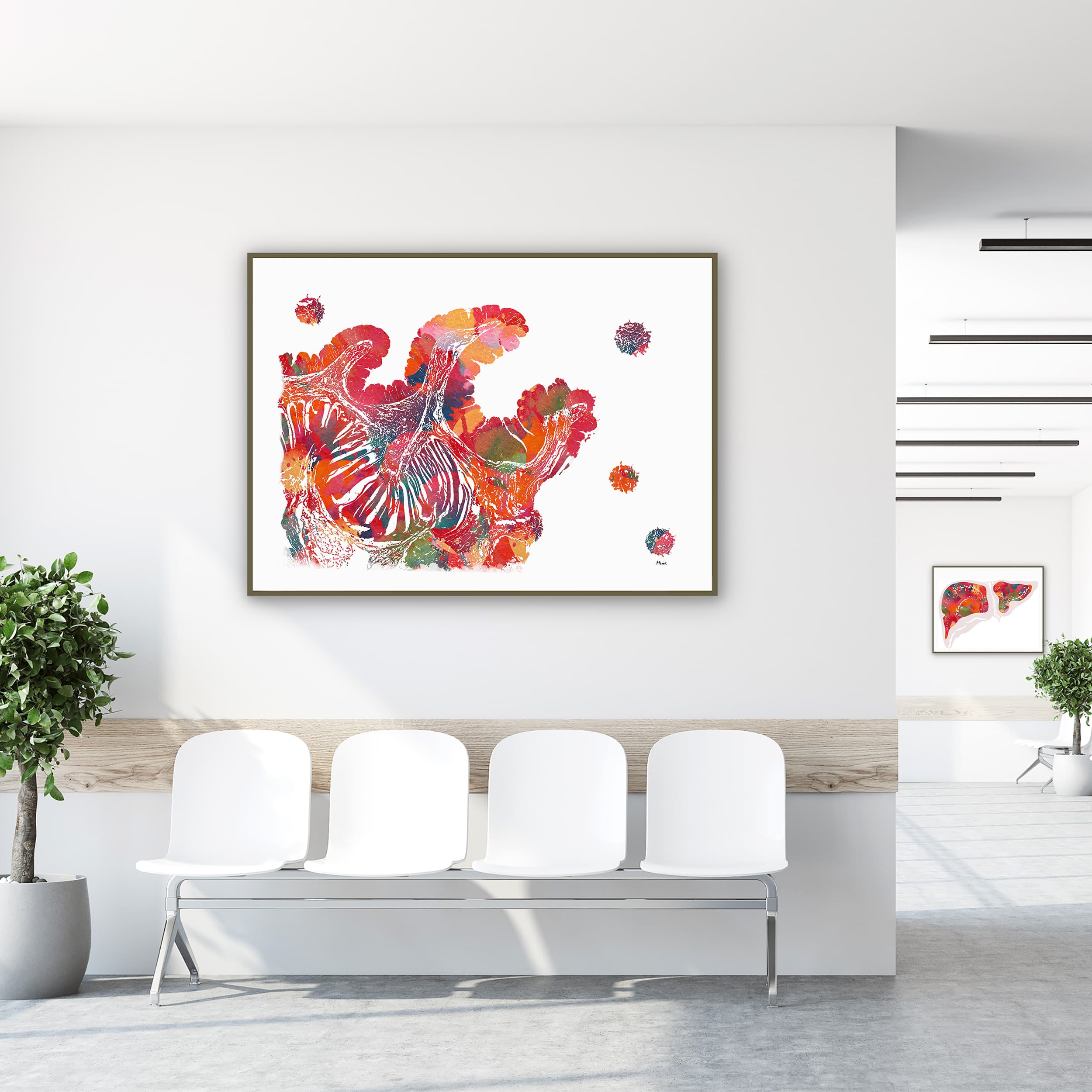 Framed colon histology watercolor print in a clinic waiting room