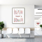 Framed dental instruments watercolor print in a clinic waiting room