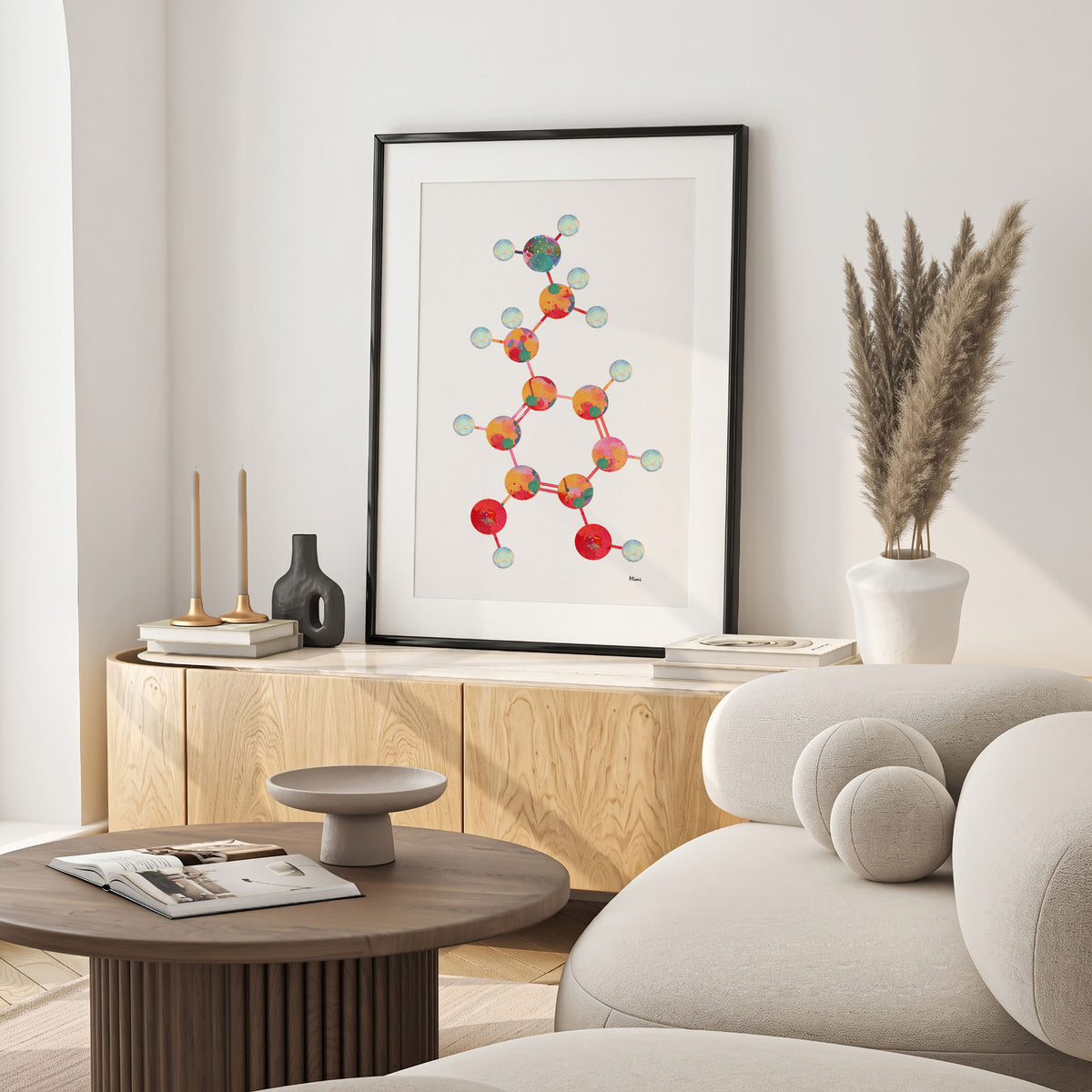 Framed dopamine molecular structure watercolor print in a warm living room