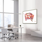Framed ear cross-section watercolor print in an ENT clinic