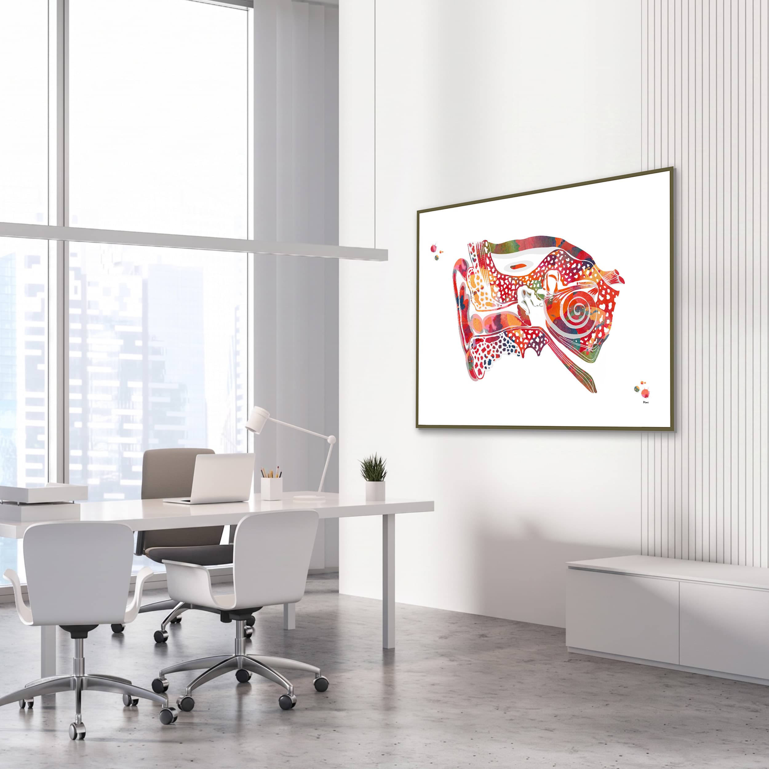 Framed ear cross-section watercolor print in an ENT clinic