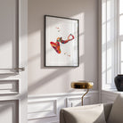 Framed eardrum anatomy watercolor print in a home living room