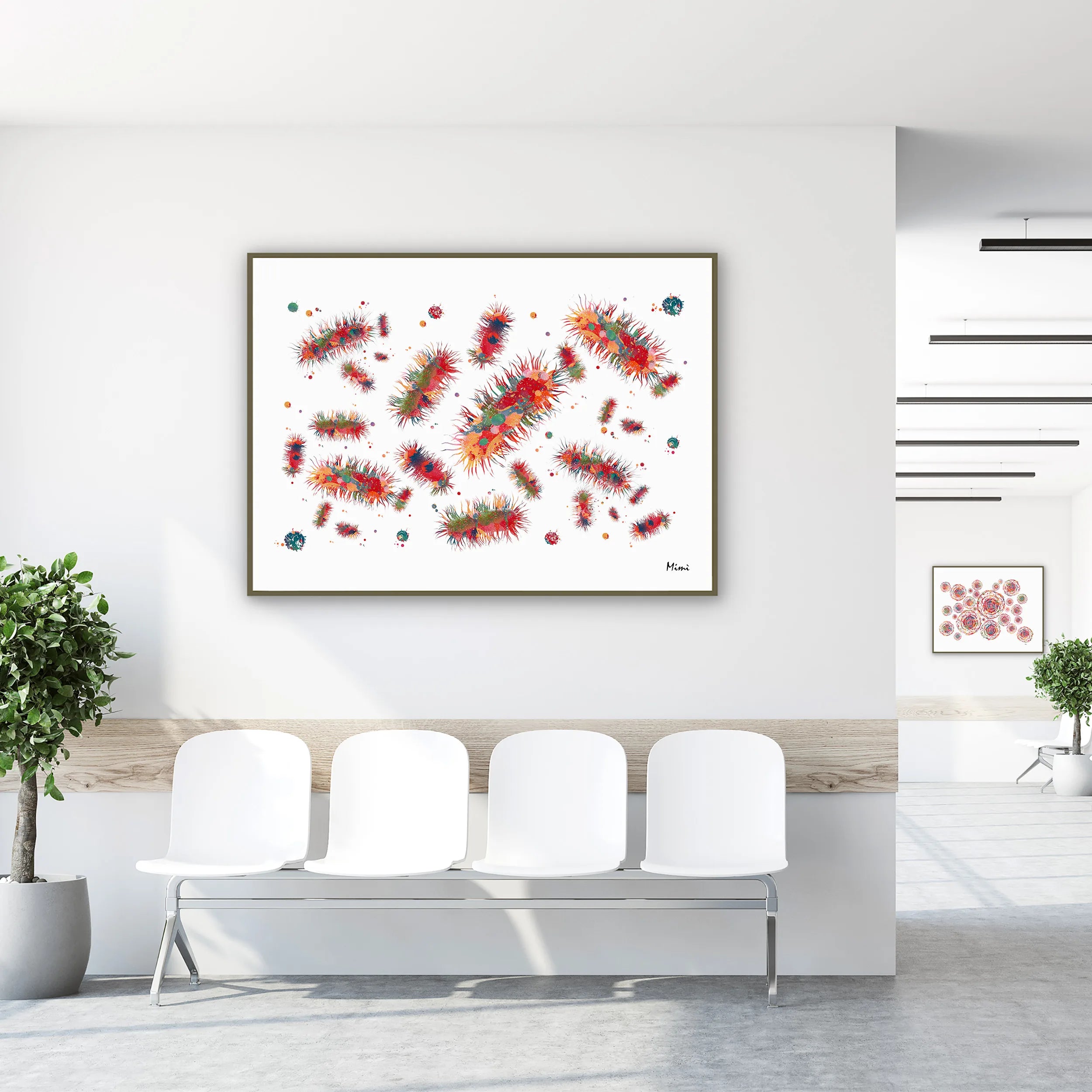 Framed escherichia coli (e. coli) watercolor print in a clinic waiting room