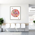 Framed fallopian tube anatomy watercolor print in a clinic waiting room