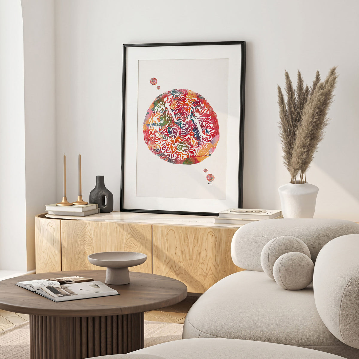 Framed fallopian tube anatomy watercolor print in a warm living room