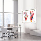 Framed foot & hand bones watercolor print in an orthopedic clinic