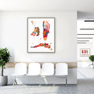 Framed foot bones anatomy watercolor print in a clinic waiting room
