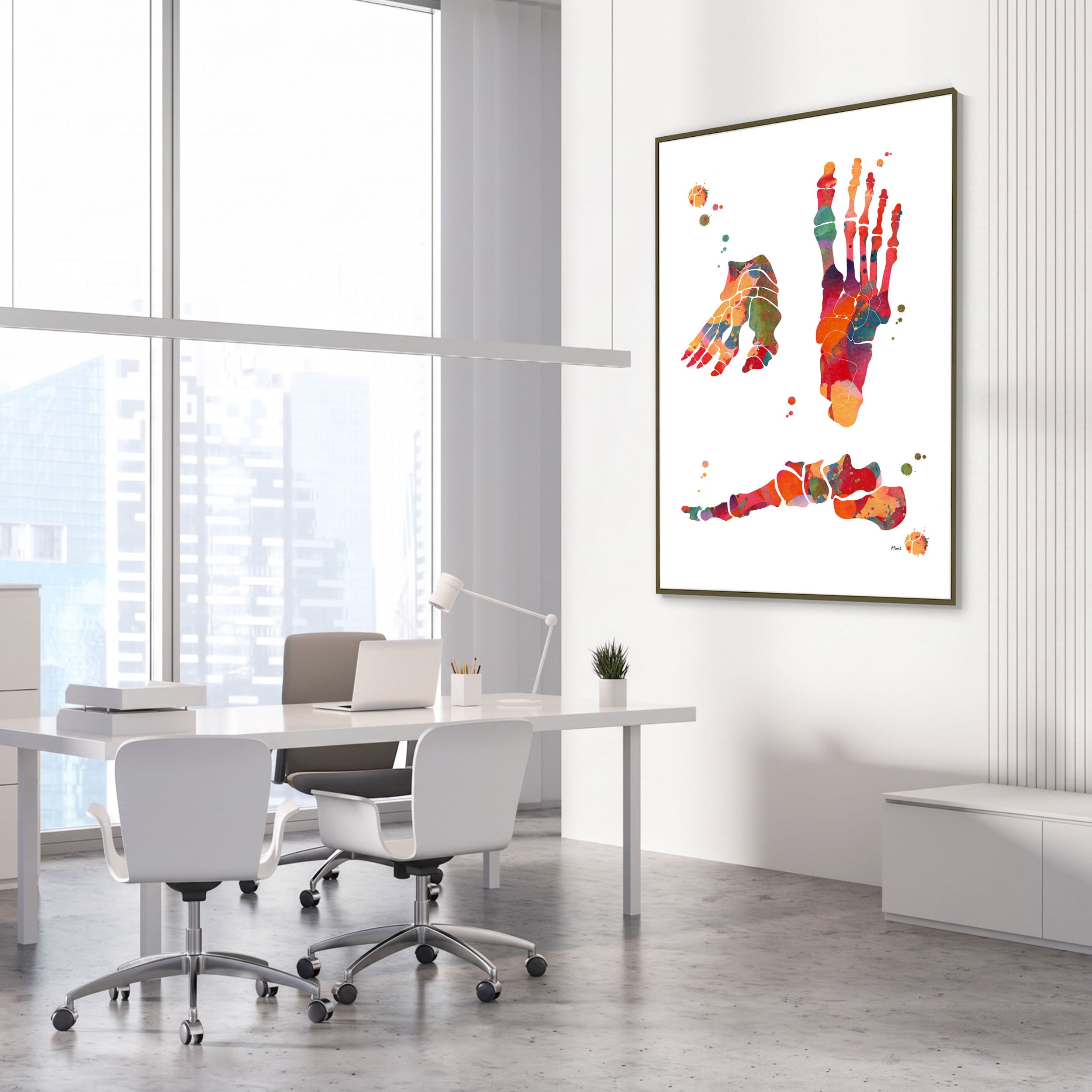 Framed foot bones anatomy watercolor print in an orthopedic clinic