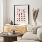 Framed german fingerspelling alphabet watercolor print in a warm living room