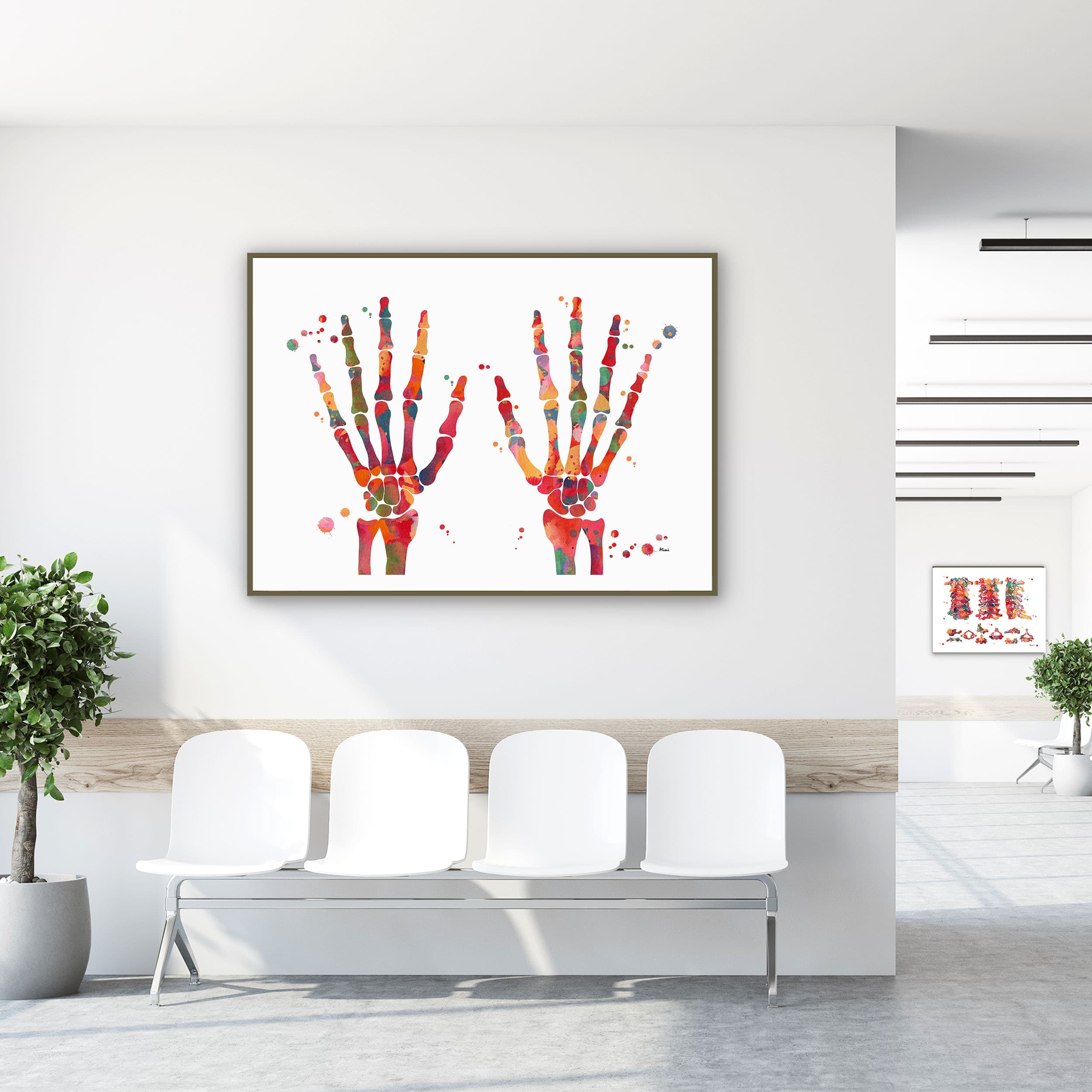 Framed hand bones & joints watercolor print in a clinic waiting room