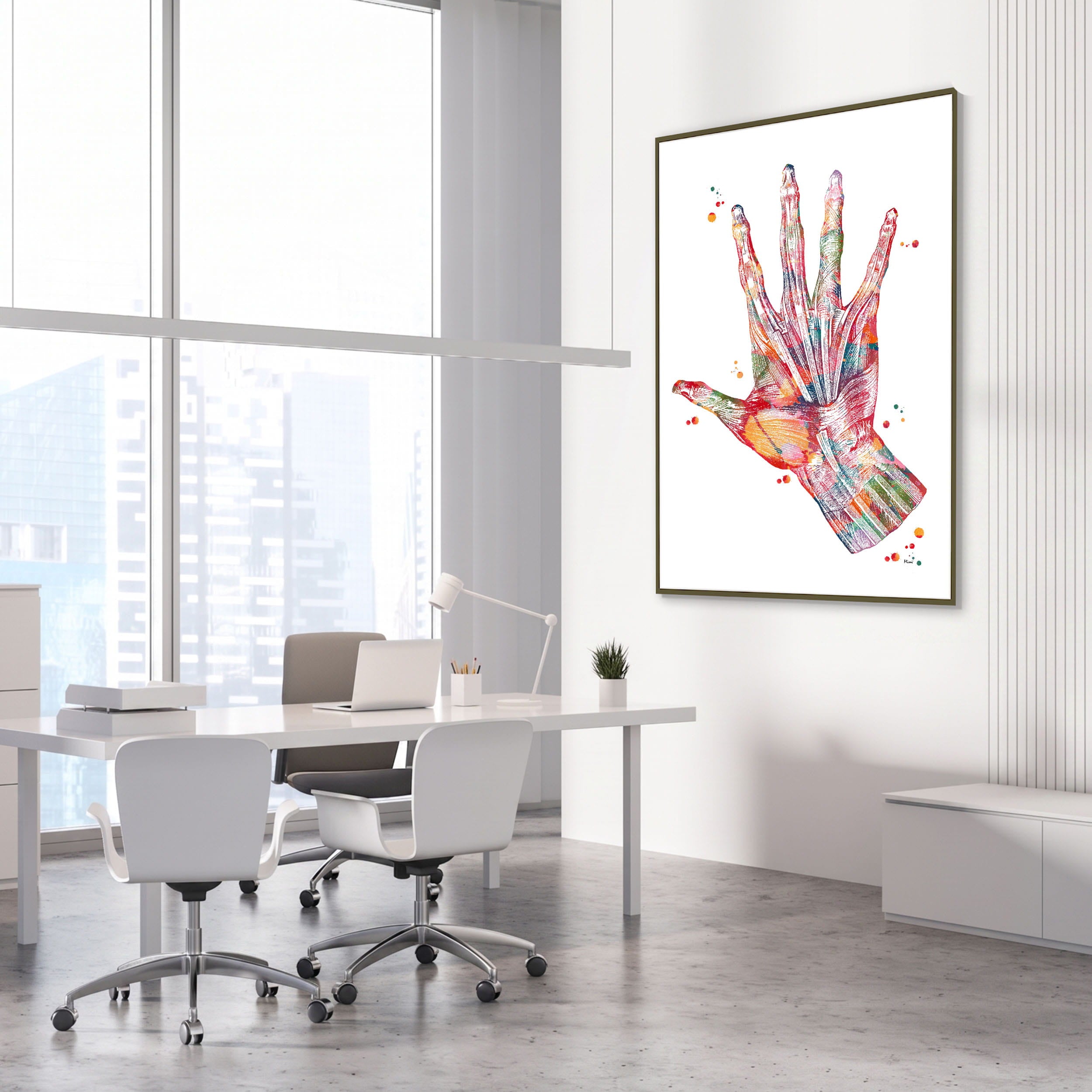 Framed hand muscles anatomy watercolor print in an orthopedic clinic