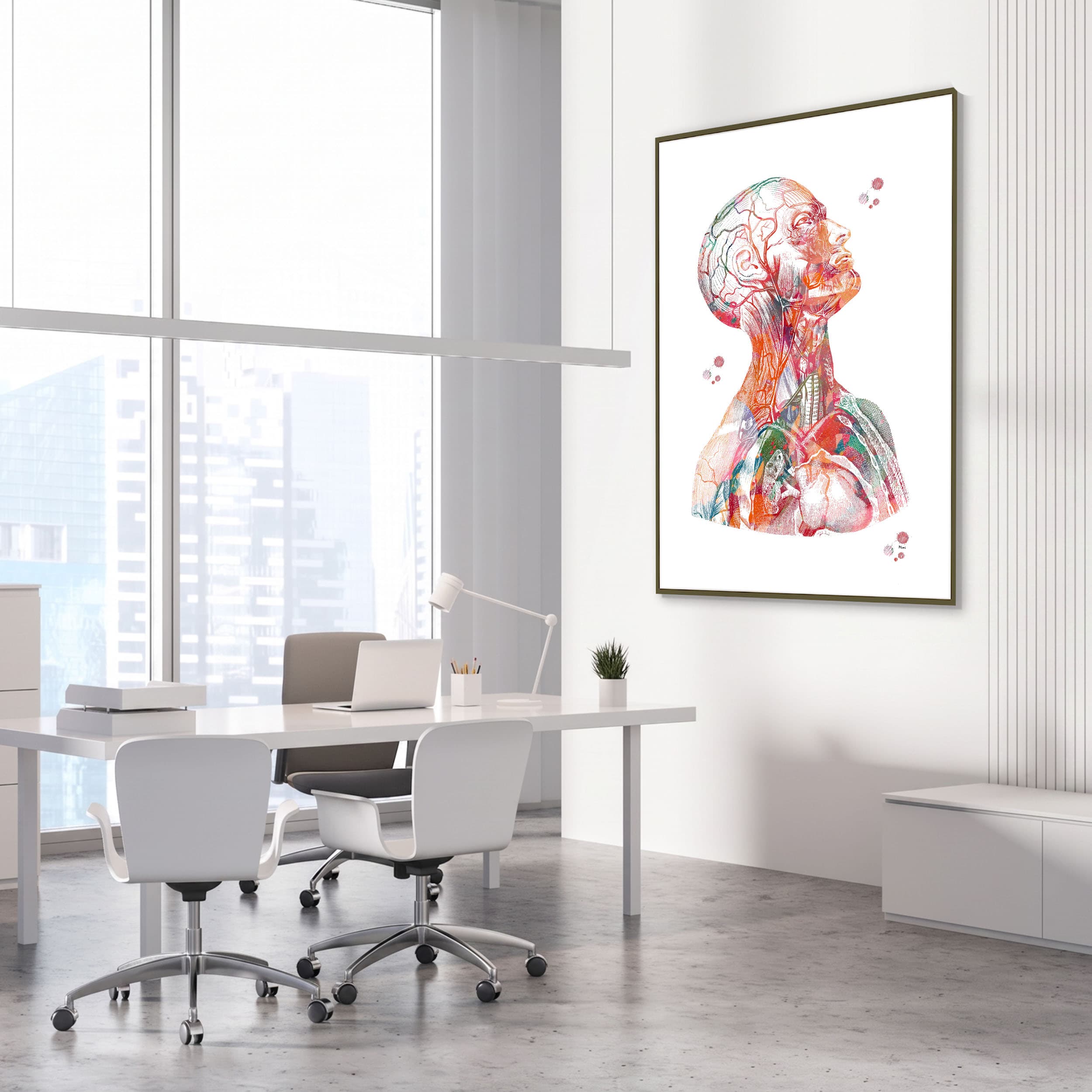 Framed head & torso anatomy watercolor print in an orthopedic clinic