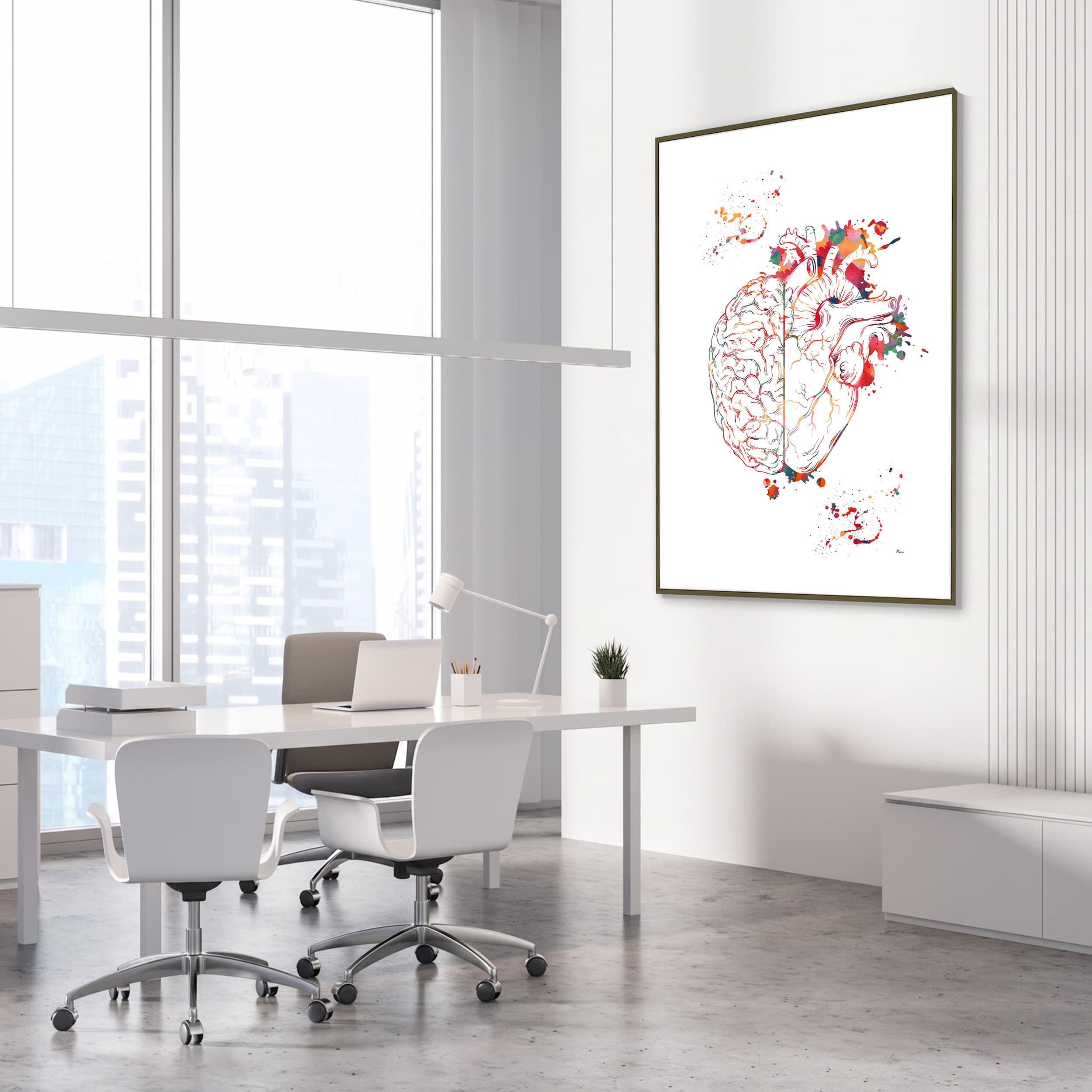 Framed heart & brain balance watercolor print in a medical clinic