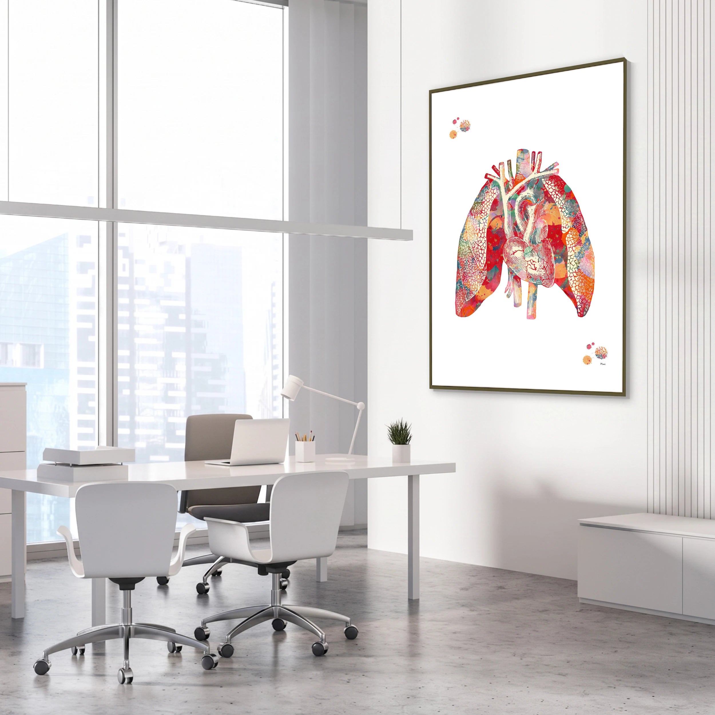 Framed heart and lungs watercolor print in a cardiology clinic