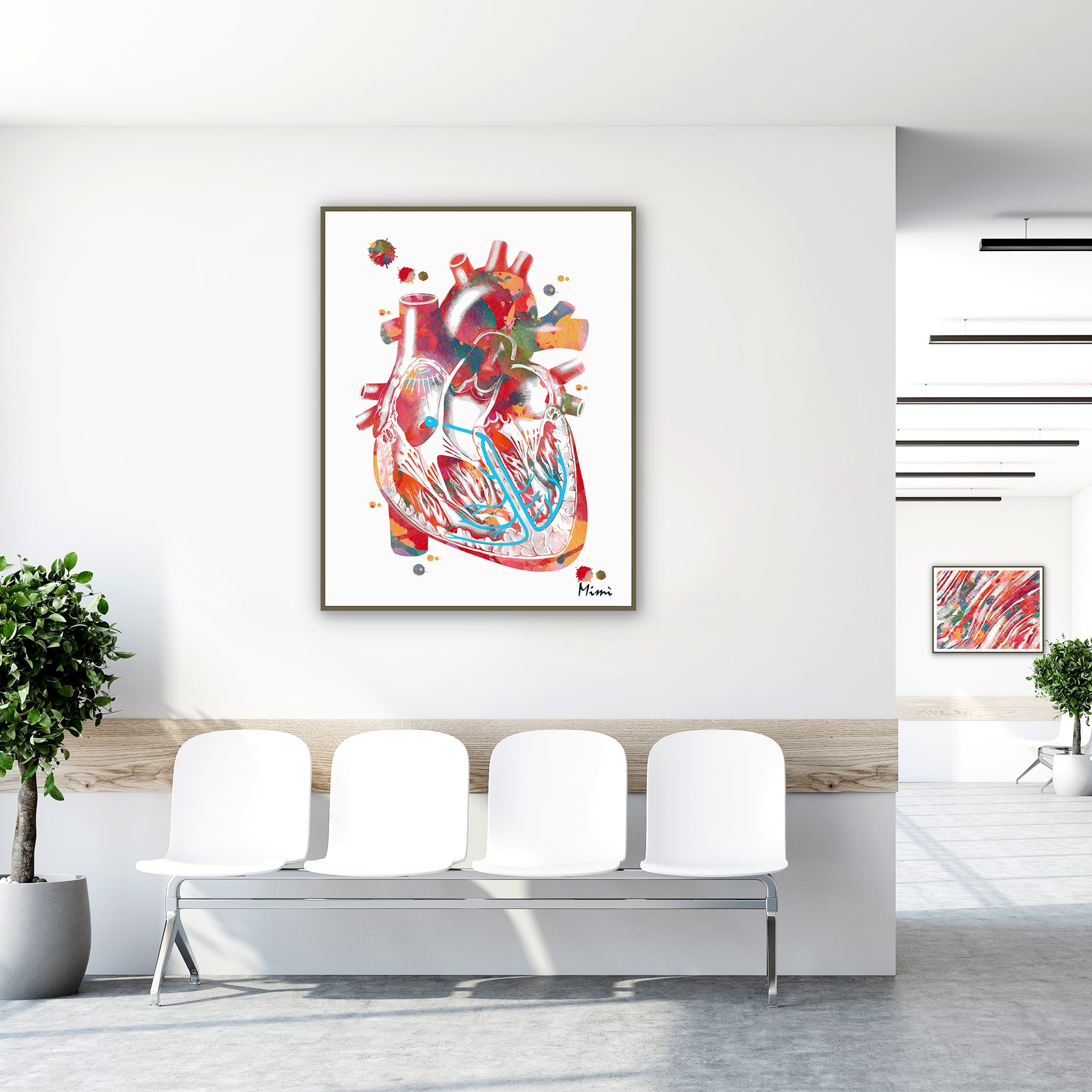 Framed heart conduction system watercolor print in a clinic waiting room