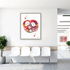 Framed heart valves watercolor print in a clinic waiting room